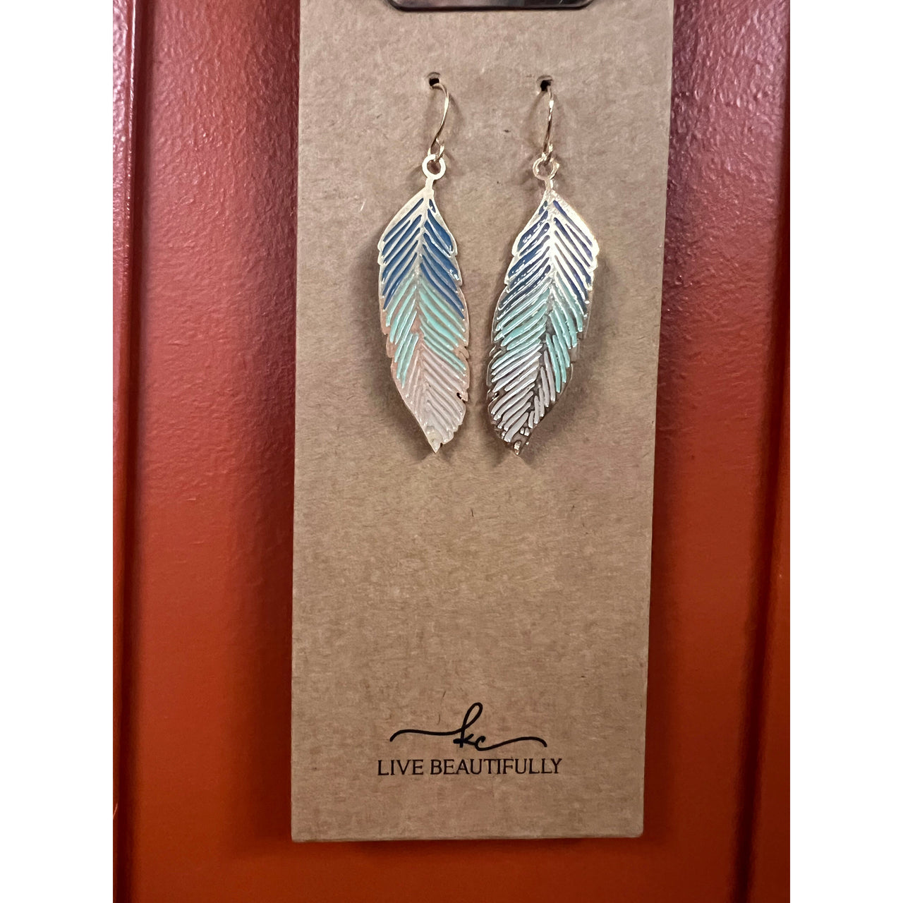 Live Beautifully Earrings - Ocean Feather