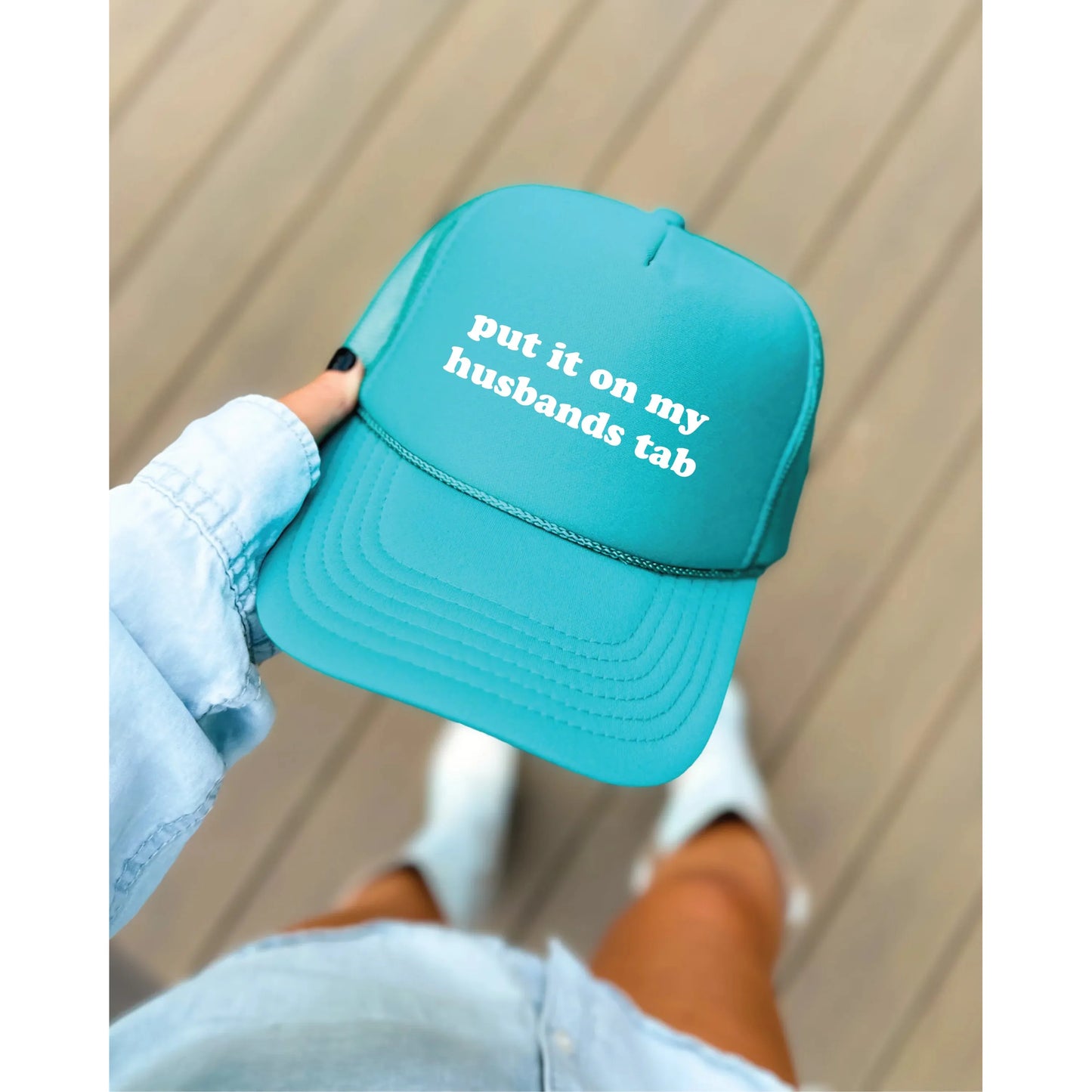 Blonde Ambition Put It On My Husbands Tab Trucker Cap- Multiple Colours