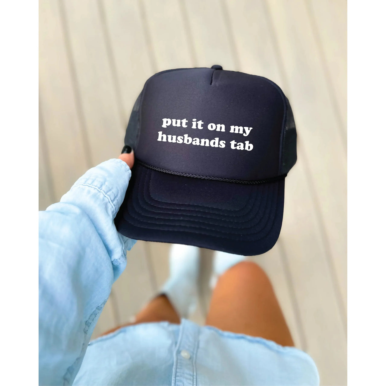 Blonde Ambition Put It On My Husbands Tab Trucker Cap- Multiple Colours